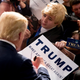 Young Trump supporter trying to speak with the man himself (AP Photo/Andrew Harnik)